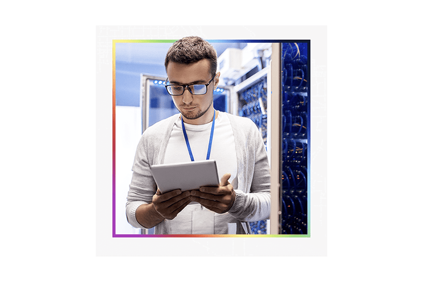 An IT expert managing cloud maintenance in a server room